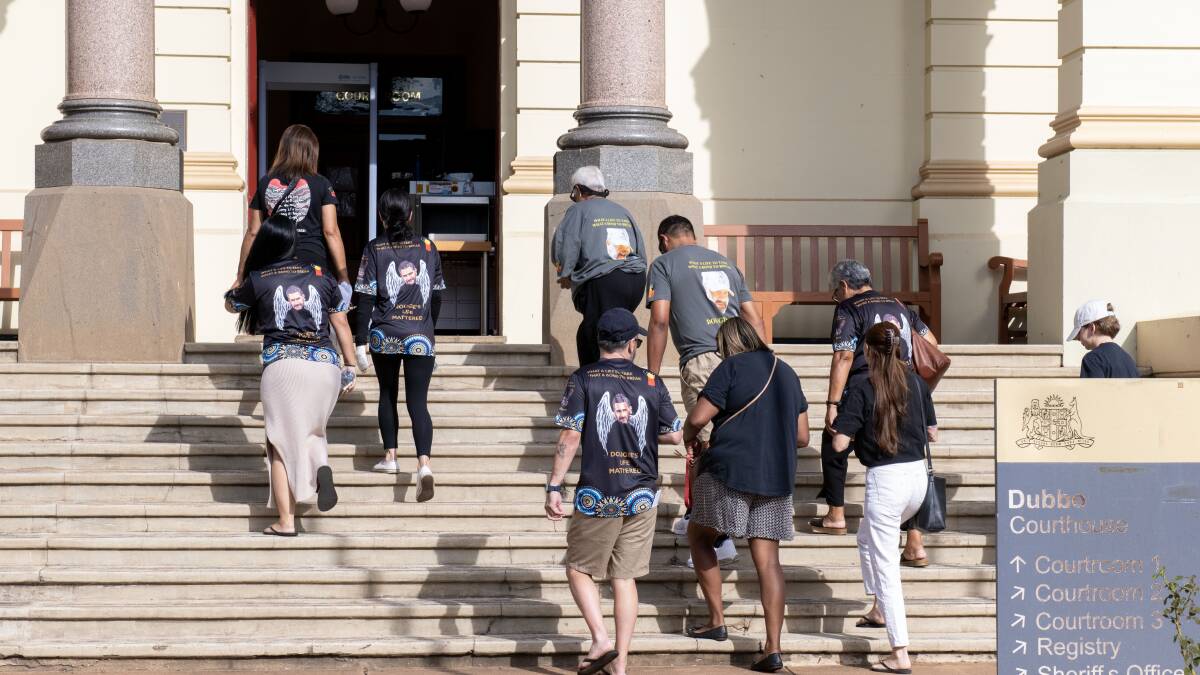 Family and friends of Ricky Hampson Jr enter Dubbo court on March 7, 2024, to hear family statements at the close of the inquest. Picture by Belinda Soole